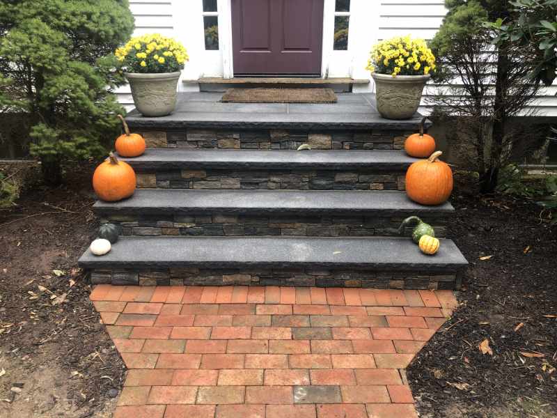 flagstone stairs, brick, and pumpkins
